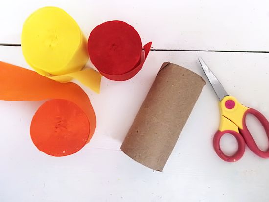 Gather paper streamers and a cardboard roll.