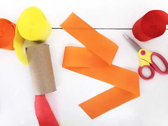 Cut a paper streamer to desired length.