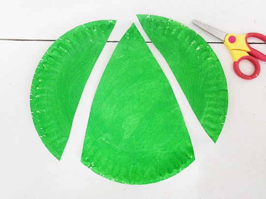 Cut paper plate into a point.