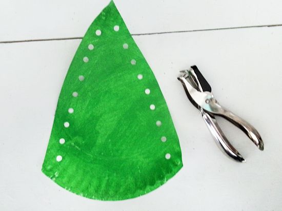 Make holes on both sides of tree shape.