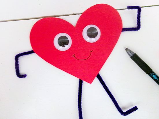 Use black pen to draw a simple smile.