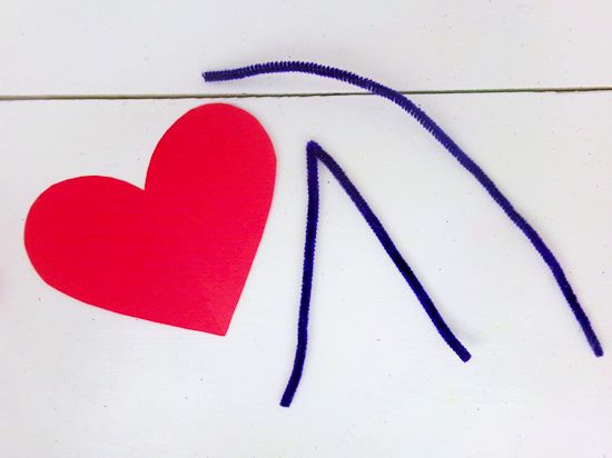 Gather two pipe cleaners. Bend one of the pipe cleaners in half.
