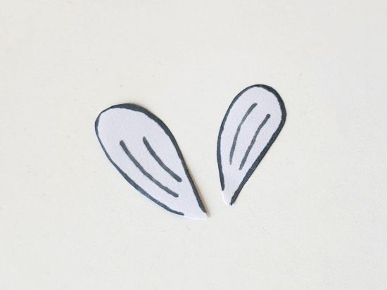 Add detail to wings.